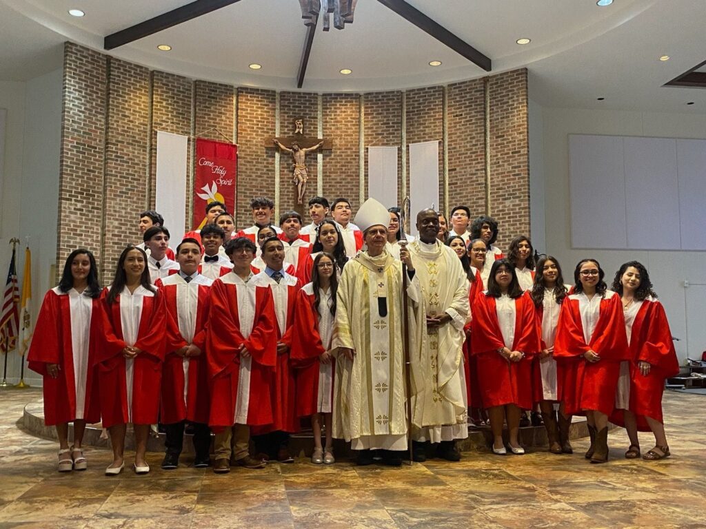 Newly confirmed youth at Mass