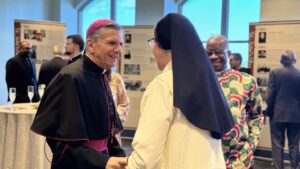 Archbishop Gustavo greeting a nun at the Assumption Seminary Gala