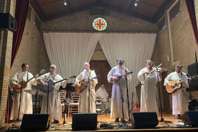 Hillbilly Thomists performing music in a church