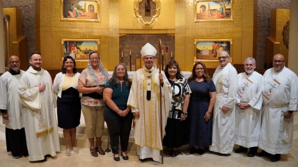 Archbishop Gustavo with acolytes and lectors at Mass