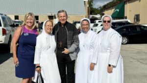 Archbishop Gustavo with nuns at St. James the Apostle