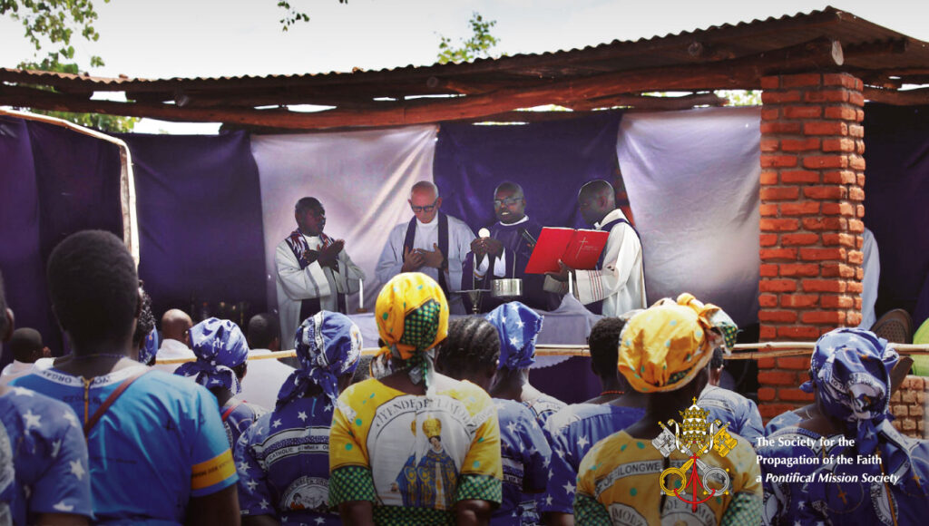 Priest celebrating Mass outdoors