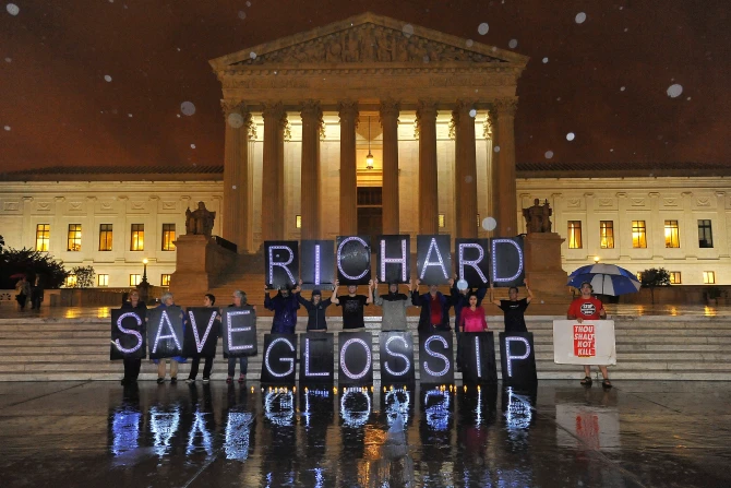 Anti-death penalty activists rally outside the U.S. Supreme Court