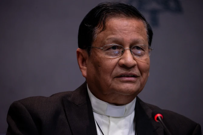 Cardinal Charles Bo speaks with journalists at a Synod on Synodality press briefing