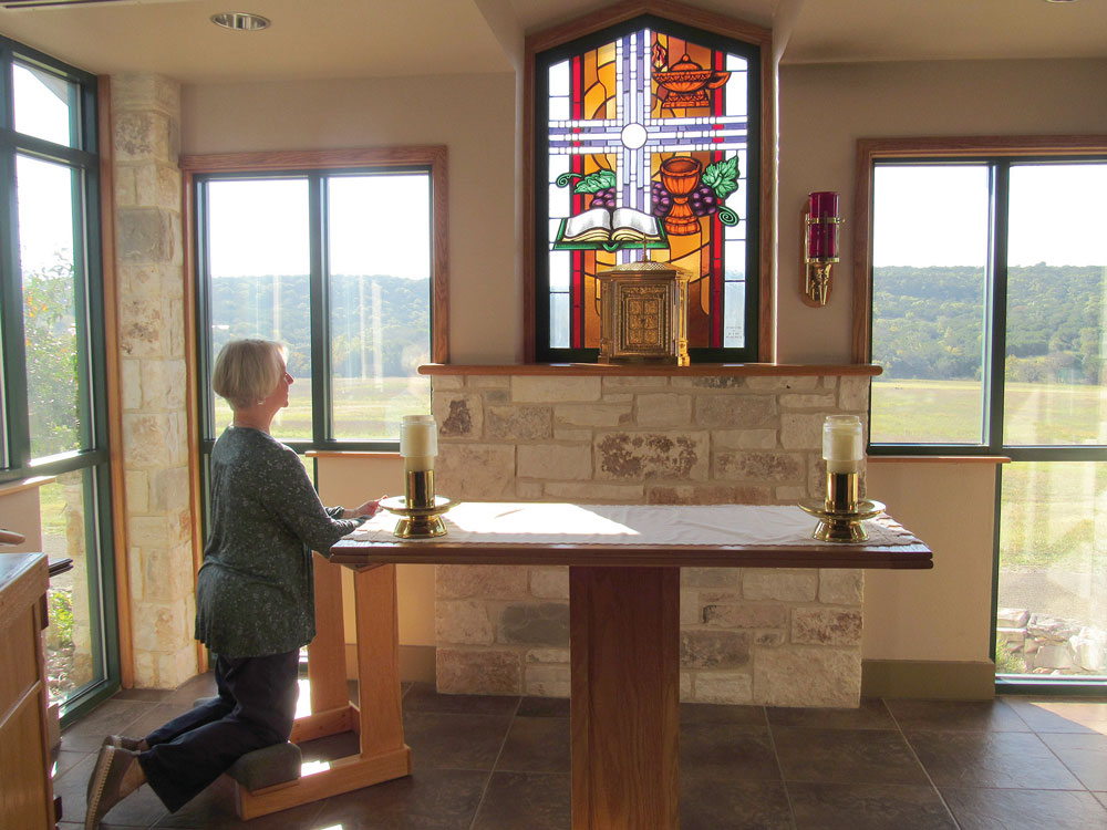 Woman in prayer at St. Peter Upon the Water: A Center for Spiritual Direction